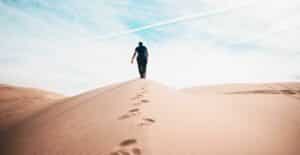 Man walking on the sand